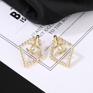 CHANEL Gold Crystal-Trimmed Diamond Outline CC Logo Stud Earrings